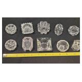 Ten assorted salt cellars.