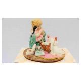 Enesco Presents Laura