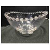 Candlewick three-toed glass bowl. Swooped rim