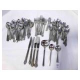 Flatware-29 spoons. 22 table spoons, 4 knives