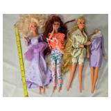 4 Barbie Dolls & outfits; 3 stamped Mattel 1966