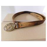Coop Blue Gard Buckle on well used Leather Belt
