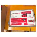 International Super 100 Electric Fencer- powers