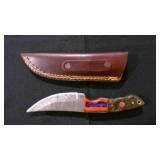 A Fixed-Blade Knife With Sheath