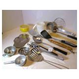Utensils, measuring cups, spoon rest