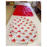 2 Plastic Christmas Table Covers - Round is 52"