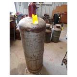 LP bottle, 50' tall x 14' wide