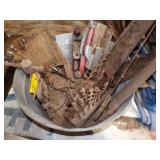 wash tub full of older wood tools