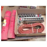 box of sockets, hose and welding rod
