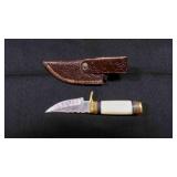 A straight Back Knife With Sheath