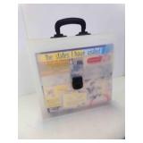 Storage Case with Some Scrap Booking Sheets