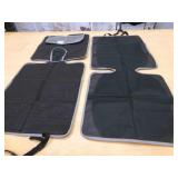 2 car seat protectors--NEW