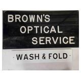 2 signs; Brown