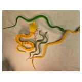 5 plastic snakes