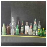 21 vintage bottles; some with content