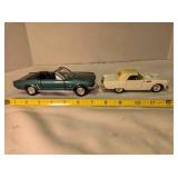 2 Ford sports models; 1964 convertible Mustang