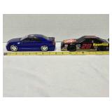 2 diecast cars; Jada 2002 Cadillac CTS, 1:24 scale