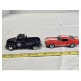 2 Kinsmart model vehicles