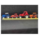 4 model tractors; Blue tractor, 4" long