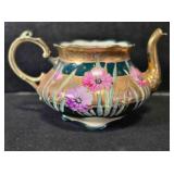 Porcelain creamer, handpainted, possibly Mignon Co
