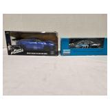 2 diecast cars; Atlas Copco Racing Team