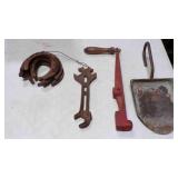 Vintage metal shovel, cast iron implement wrench