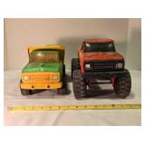 2 Tonka pressed metal trucks