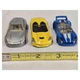 3 Hot Wheels model cars; Quick N Sic