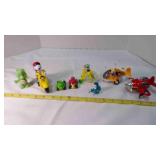 8 Comical figures; Snoopy on motorcycle