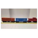 3 Lionel railroad cars - caboose, boxcar, stockcar