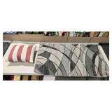 Gray accent rug & striped accent pillow