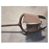 Vintage hand-powered post hole digger, 74" long