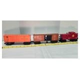 3 Lionel railroad cars - caboose, boxcar, stockcar
