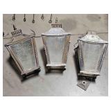 3 outdoor lanterns - one has a broken top piece