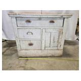 White, wood cabinet, 3 drawers, a door