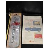 Metal thermometer & vintage Ford advertisement