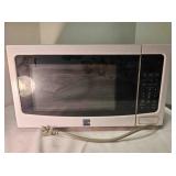 Kenmore microwave oven - turns on