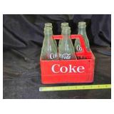 5 Coke bottles & plastic carton; 6ï¿½ oz bottles