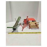 2 vintage pressed steel farm implements