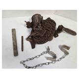 Corn sheller, Dairy cow hobbles, whetstone, pipe