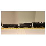 3 Lionel railroad cars - engine, coal car, flatbed