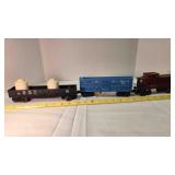 3 Lionel railroad cars - caboose, boxcars