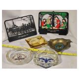 Four ashtrays & 2 promotional plastic hangings