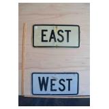 East, West Metal Signs