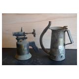 Vintage oil can and antique blow torch