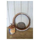Champlin gas can, tractor seat, old wheel