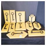 11 vintage cast iron keys (Jail Keys?)wood plaques