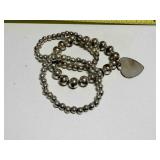 3 Silvertone Bead Stretch Bracelets