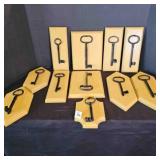 11 vintage cast iron keys (Jail Keys?)wood plaques