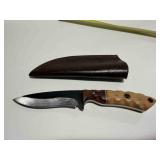 Skinner Knife with a brown carved wooden handle